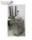 Filling machine for hot pasty products