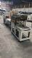 Automatic L-sealer with shrink tunnel.