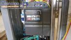 Automatic double head labeling machine for flat bottles Bauch Campos
