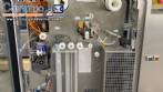 Tetra Pak A3 aseptic filling machine with cardboard packer 70 and tray shrink 51.