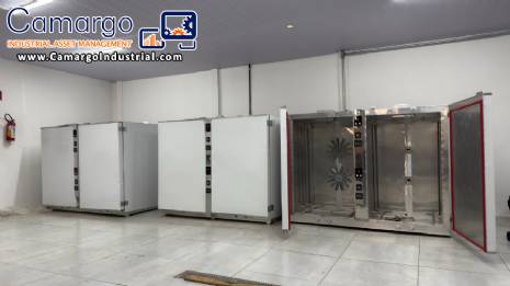 Stainless steel dehydrator oven with 120 trays.