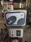 Automatic self-adhesive labeling machine for cylindrical bottles