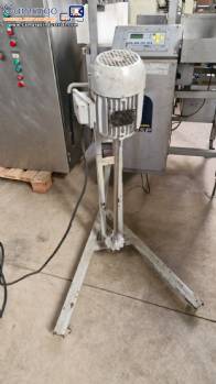 Column mixer agitator with Cowles-type disc