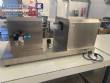 Cetro benchtop ultrasonic tube and pipe filling and dosing machine.