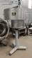 Complete filling line with Tecman Nelpas Tecnoenvase Tudela bottle filling, labeling, capping, and positioning machines for cosmetic liquids.