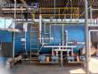 Wood-fired flame tube boiler for steam generation