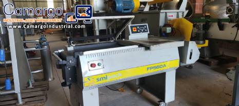 L-shaped sealer with shrink tunnel for packaging packages Smipack