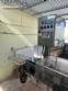 Packaging line with IMSB bung capper, Maqmundi labeler and accumulator table