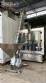 Packaging line with IMSB bung capper, Maqmundi labeler and accumulator table
