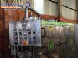 Gravimetric rotary filling machine in stainless steel with cabin