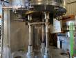 Gravimetric rotary filling machine in stainless steel with cabin