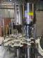 Gravimetric rotary filling machine in stainless steel with cabin