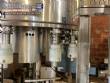 Gravimetric rotary filling machine in stainless steel with cabin