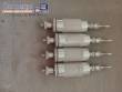 Erli rotary liquid filling machine with 4 pistons, 14,400 units per hour.