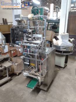 Vertical wrapping machine for triangular format