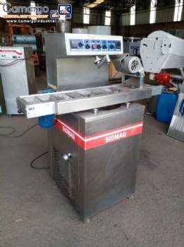 Tempering machine with cover plate coupled to Sidmaq