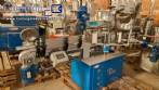 Automatic double-head labeling machine for cylindrical and flat bottles, Tudela, 3,000 labels per hour.
