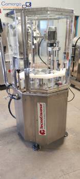 Bottle and jar screwing machine with automatic cap feeding system