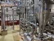 Stainless steel processing reactor tanks, 1140 liters, with pump valves.