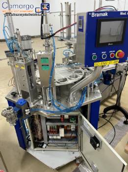 Rotary filling machine with Bramak aa jar capping sealer