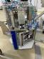 Rotary filling machine with Bramak a�a� jar capping sealer