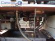 Krones automatic rotary label applicator for paper labels.