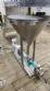 Netzsch positive displacement helical sanitary pump with feed hopper.