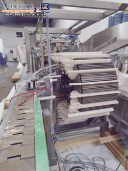 Hoppmann bottle positioner with conveyor belt