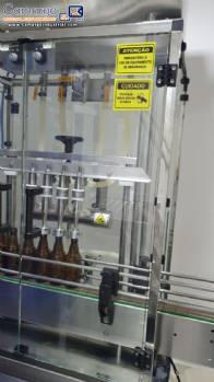 Linear filling machine with 4 stainless steel nozzles