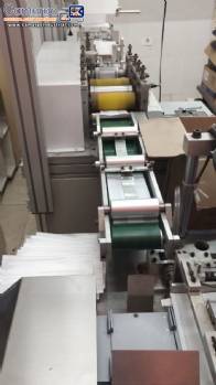 Automatic machine for disposable surgical TNT masks with nose clip, producing 150 to 180 masks per minute.