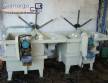 Factory line for the production of zipper sliders for clothing