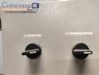 Coater with stainless steel bowl and carbon steel body