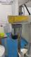 Rotmaq screw capping machine with cap positioning elevator