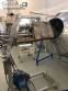 Rotary industrial roaster for roasting grains