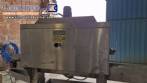 Labeling machine with steam sleeve tunnel and bottle baler