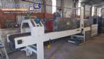 Labeling machine with steam sleeve tunnel and bottle baler