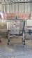 Labeling machine with steam sleeve tunnel and bottle baler