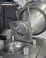 Handtmann vacuum stuffer with twister and tilting elevator, up to 6,000 kg per hour.