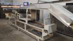 Continuous line laminator, cutter and folder for long dry pasta (tagliatelle).