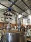 Stainless steel filling machine for beer liquids in Brabeer bottles