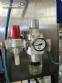 Stainless steel filling machine for beer liquids in Brabeer bottles
