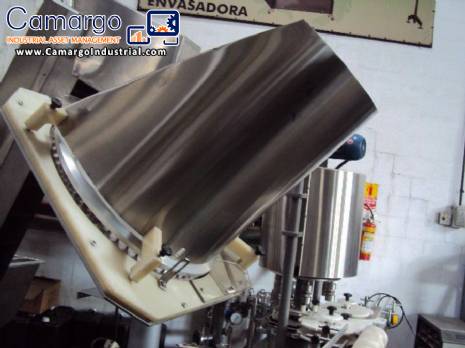 Rotary feeder and automatic covers positioner Rotary feeder and automatic covers positioner